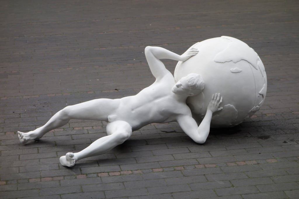 Sculpture of Atlas as a young boy, fallen off his plinth: part of Sculpture at Bermondsey Square