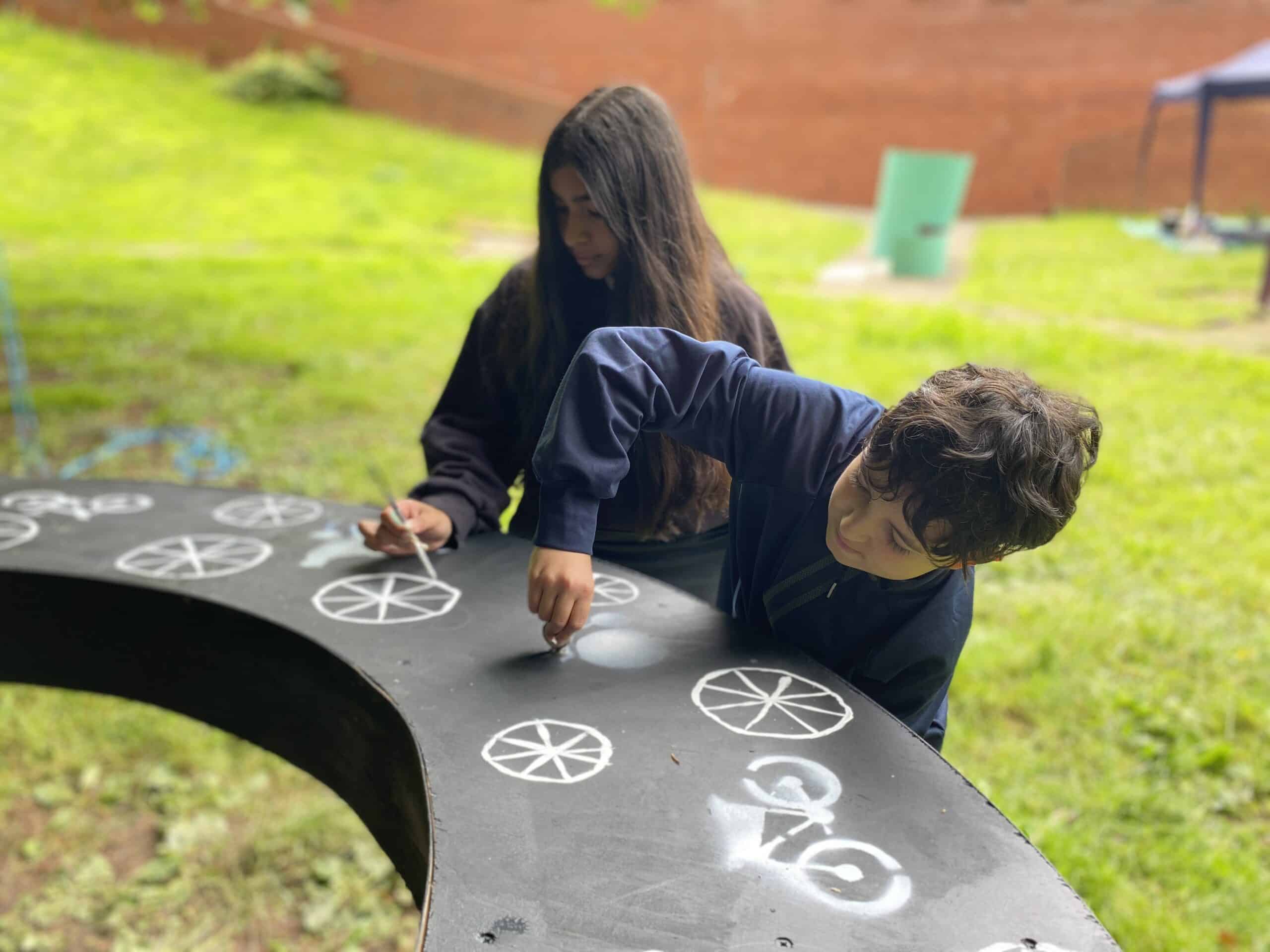 Children at Barr's Hill school make sculptural interventions in their Dell space.